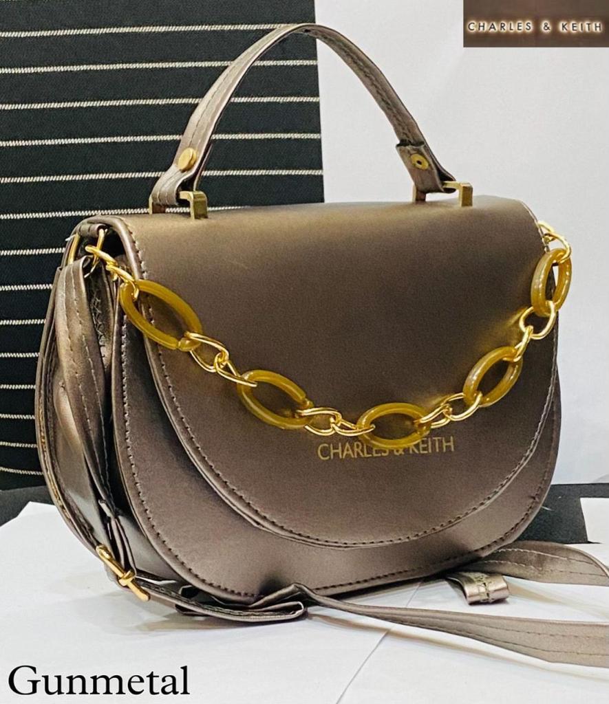 Circular Elegance: Round Shape Sling Bag with Plastic Design Chain